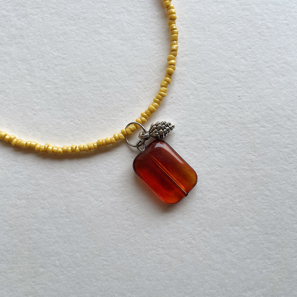 Caramel pine cone pendant necklace ✨