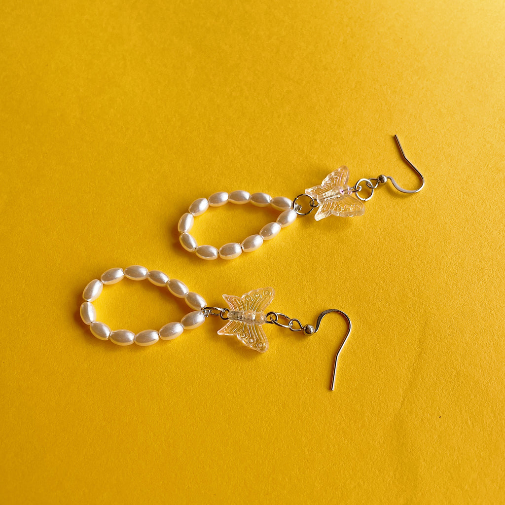 Clear butterfly loop earrings ✨