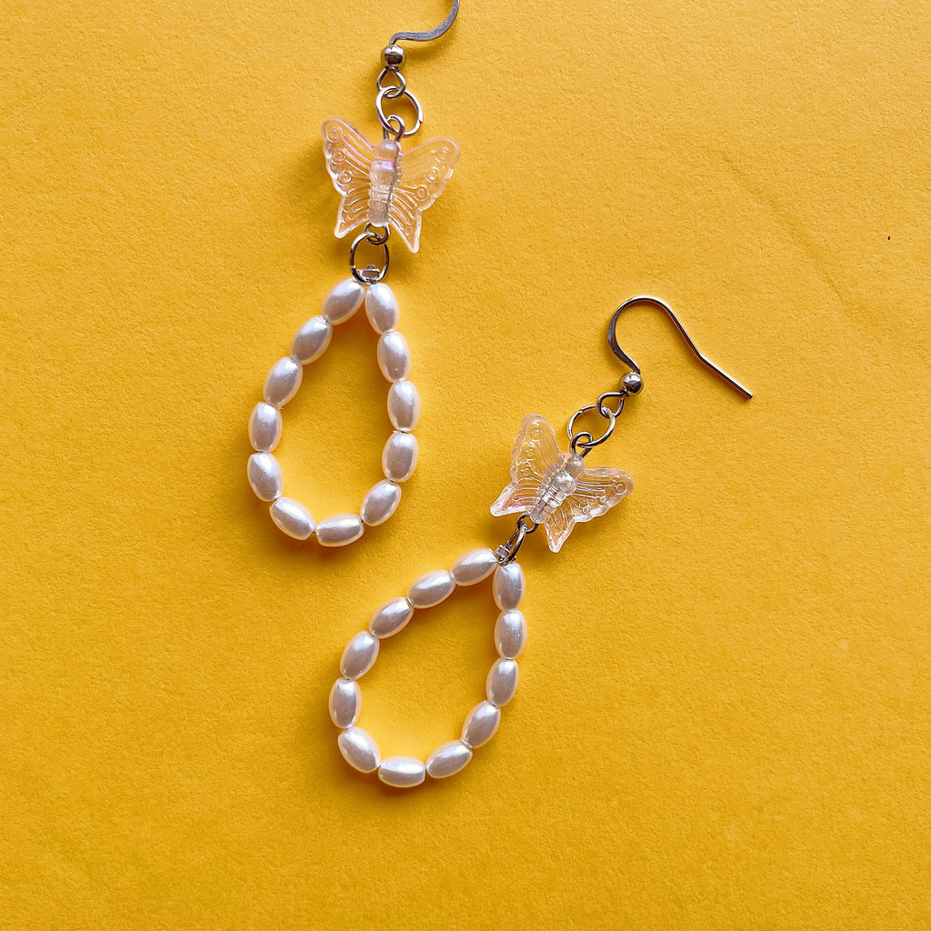 Clear butterfly loop earrings ✨
