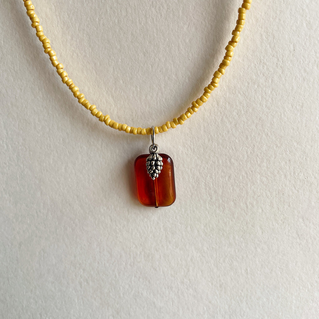 Caramel pine cone pendant necklace ✨