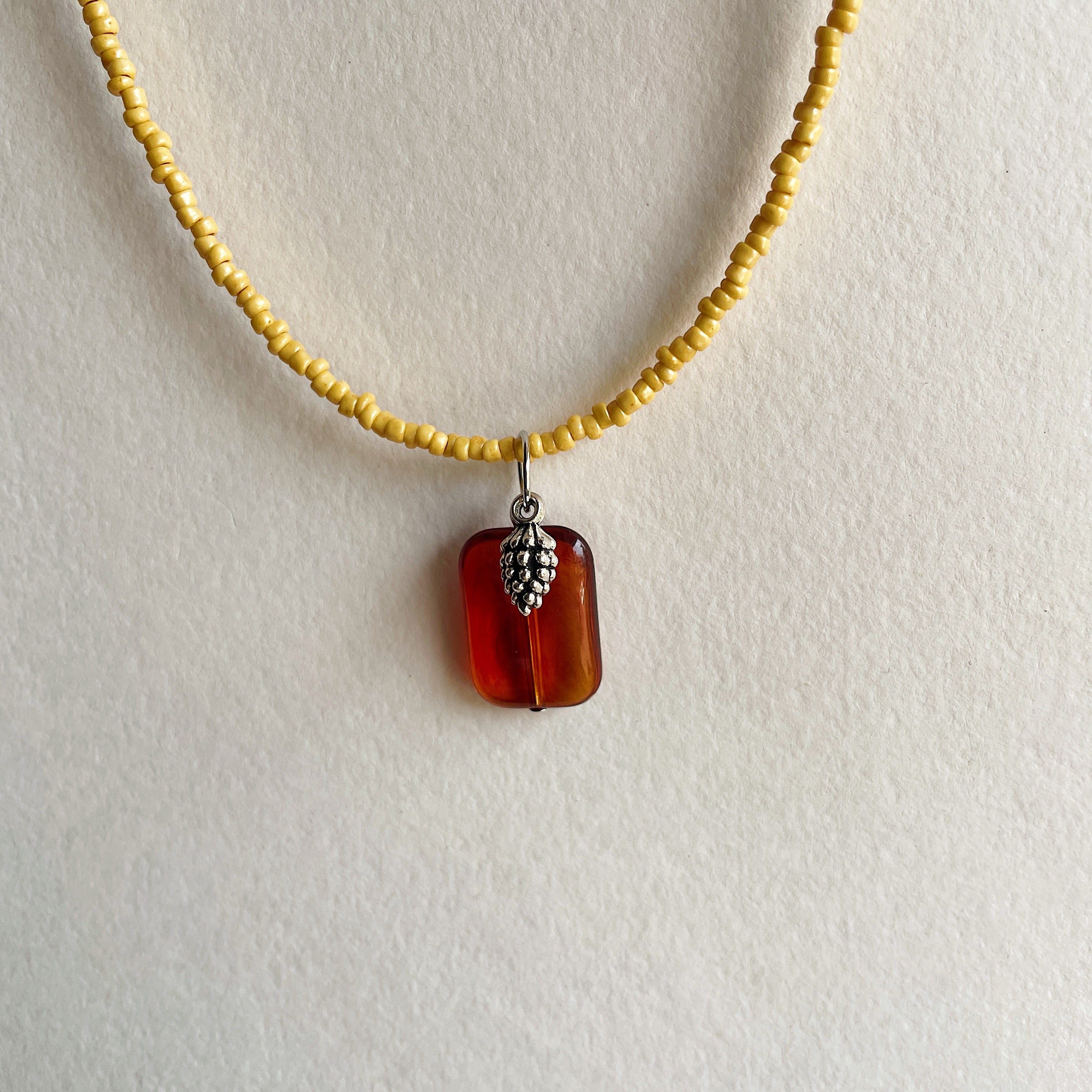 Caramel pine cone pendant necklace ✨