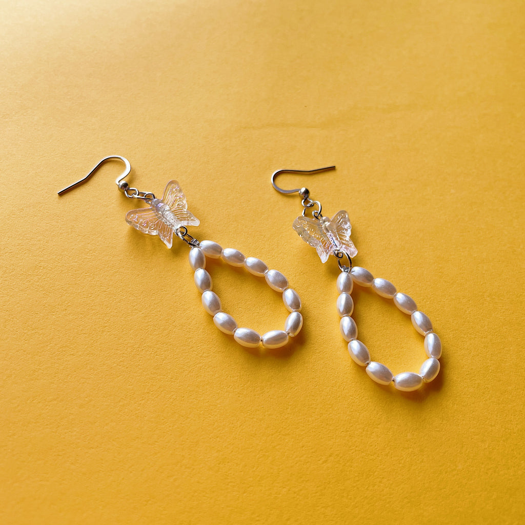 Clear butterfly loop earrings ✨