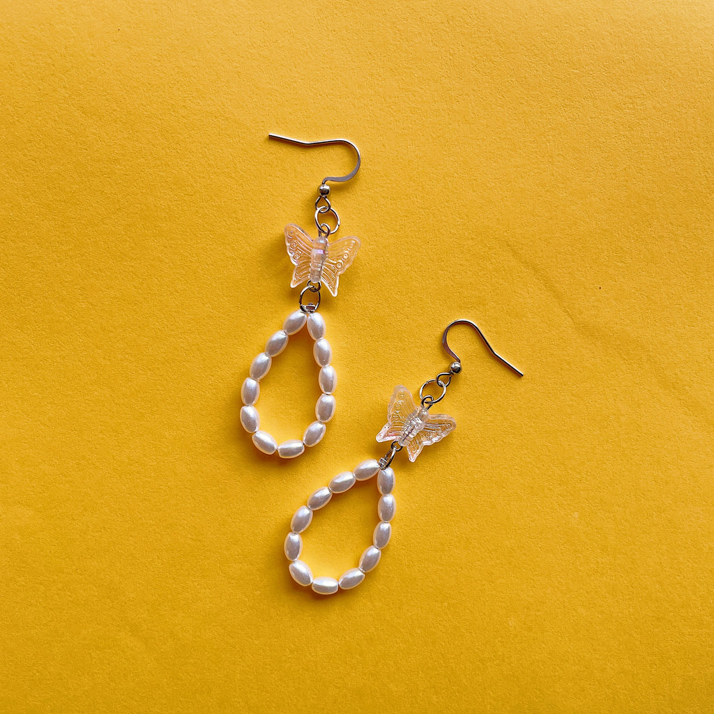 Clear butterfly loop earrings ✨
