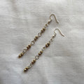 Muted gold longline beaded earrings ✨