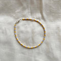 Lilac and daisy beaded anklet ✨