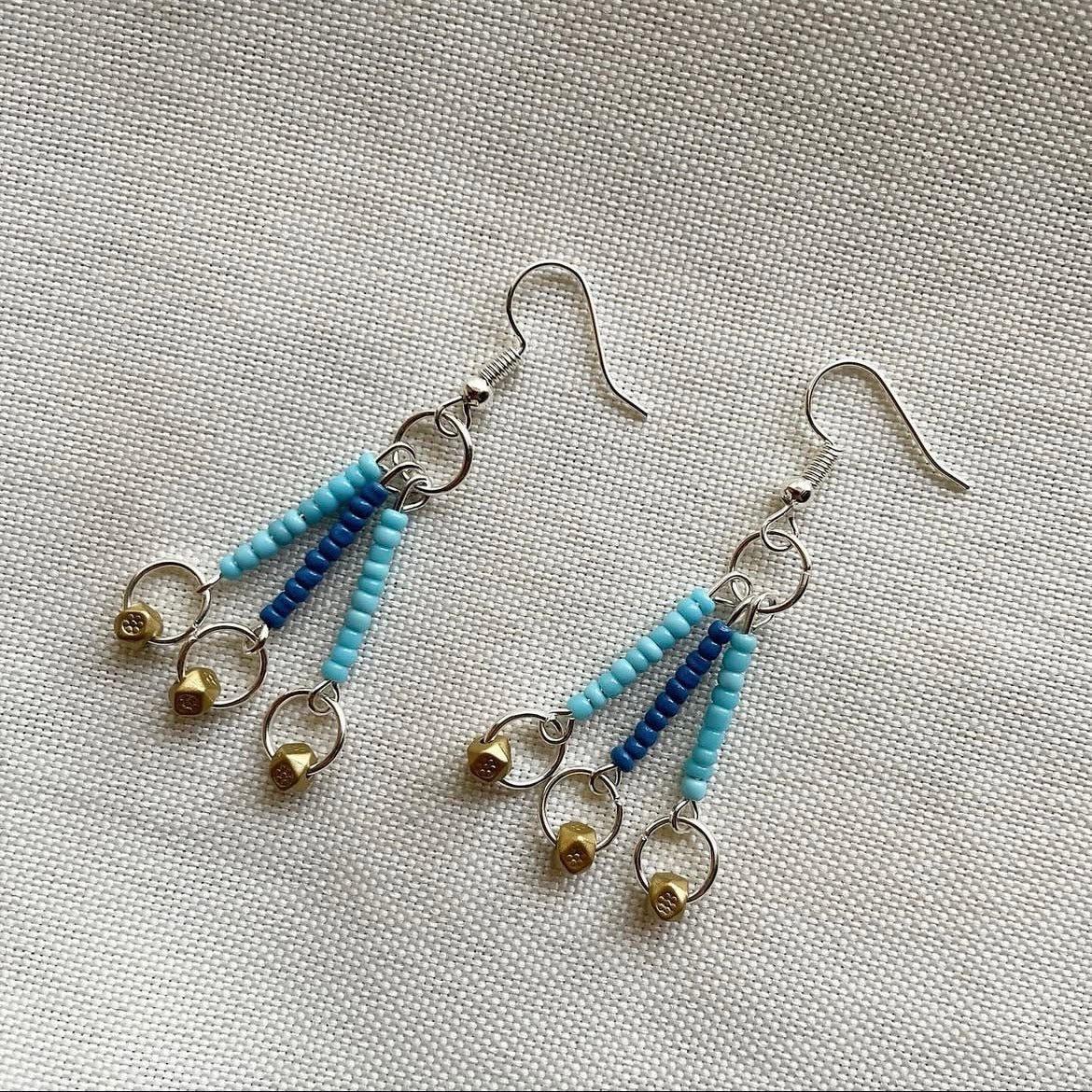 Ocean and gold beaded earrings ✨