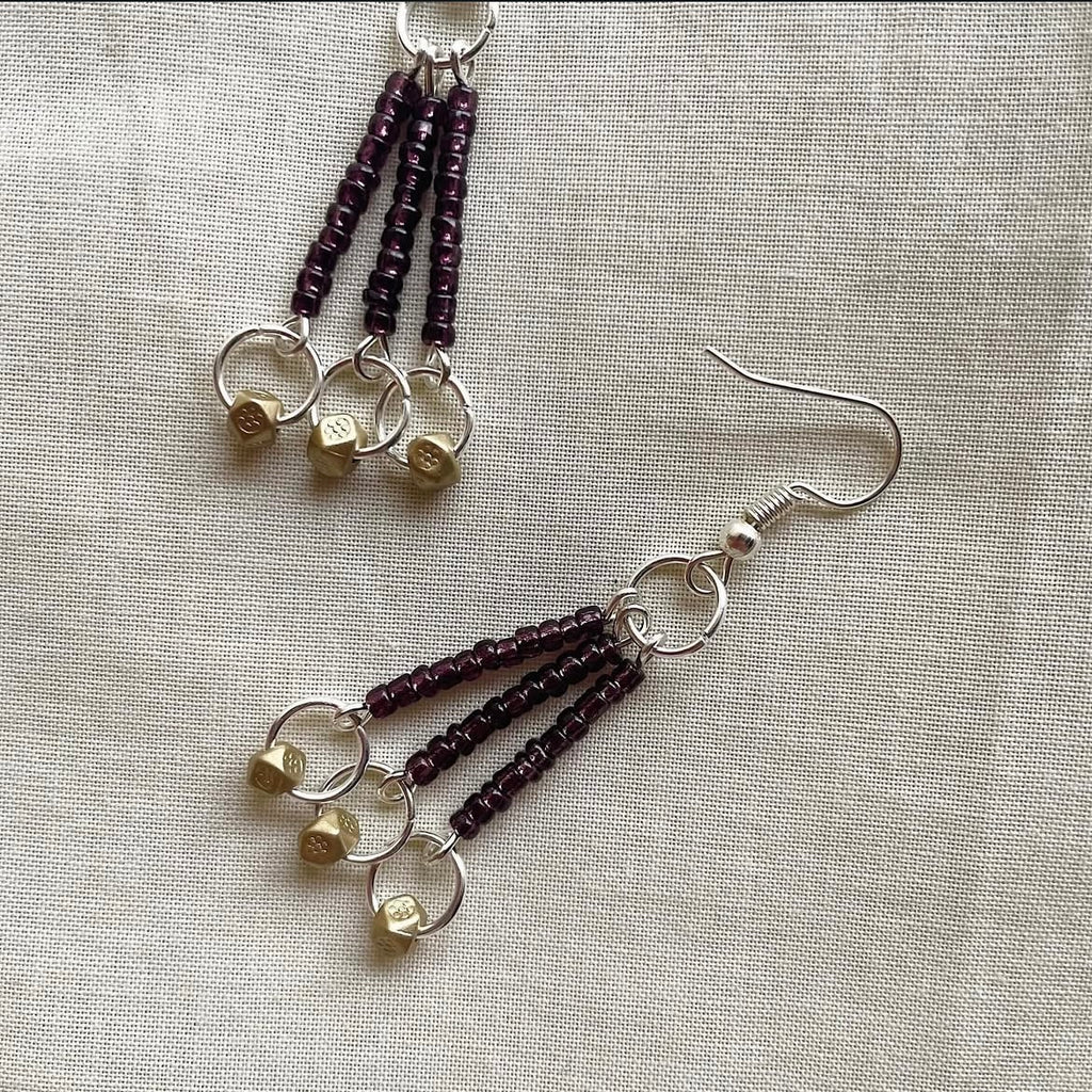 Deep purple and gold beaded earrings ✨