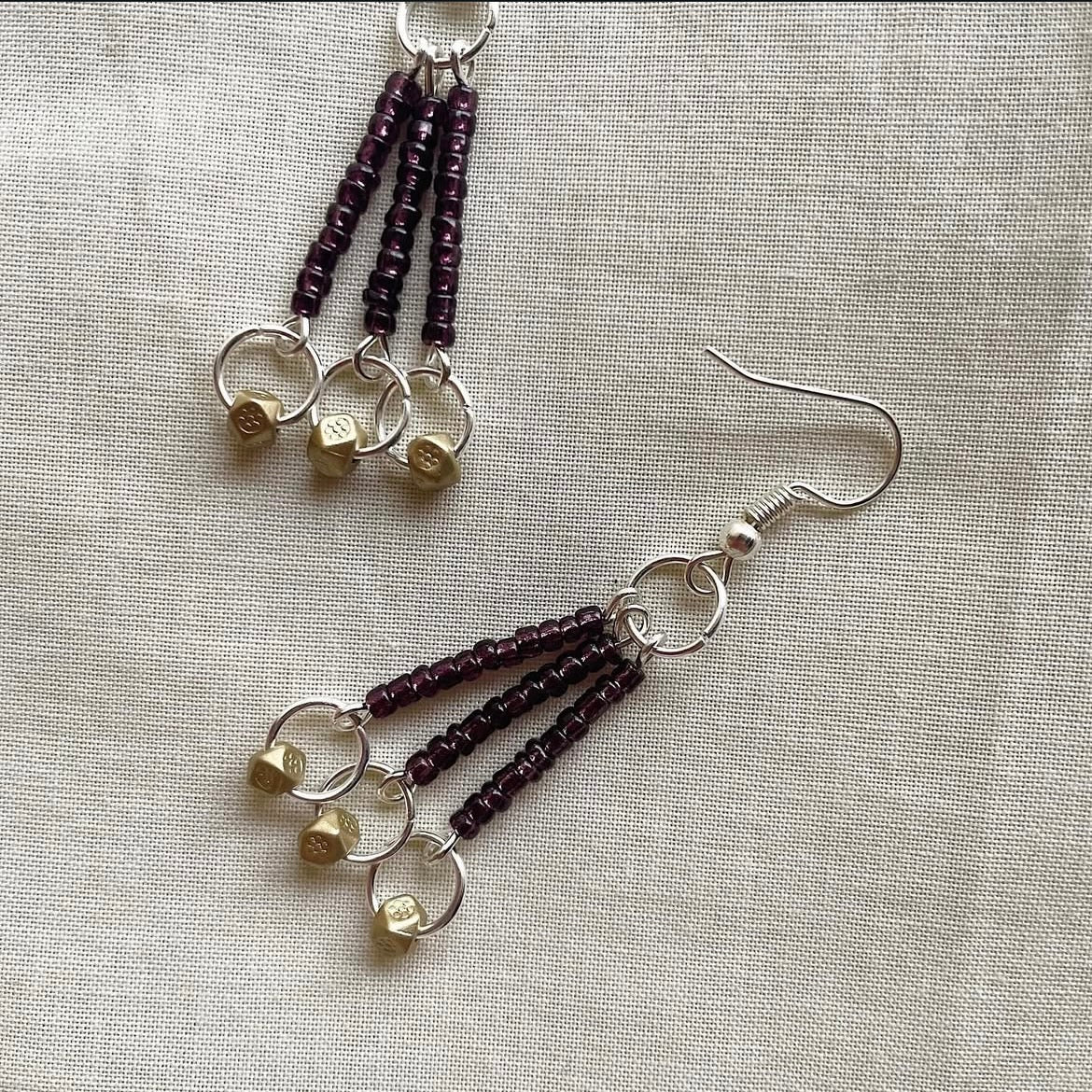 Deep purple and gold beaded earrings ✨