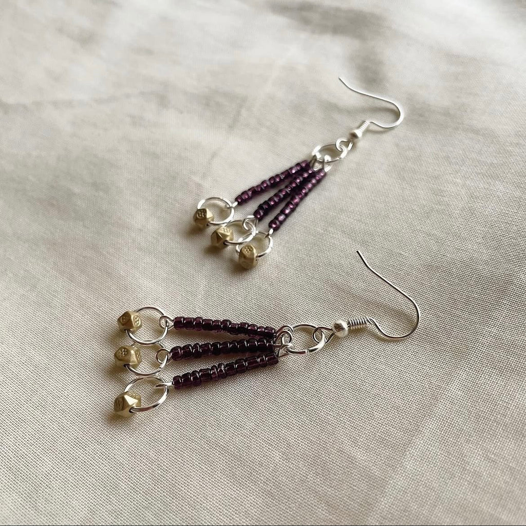 Deep purple and gold beaded earrings ✨