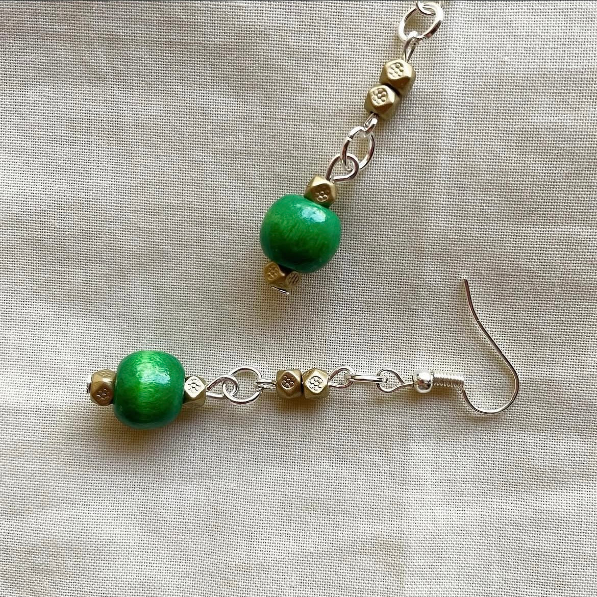 Dark green and muted gold beaded earrings ✨