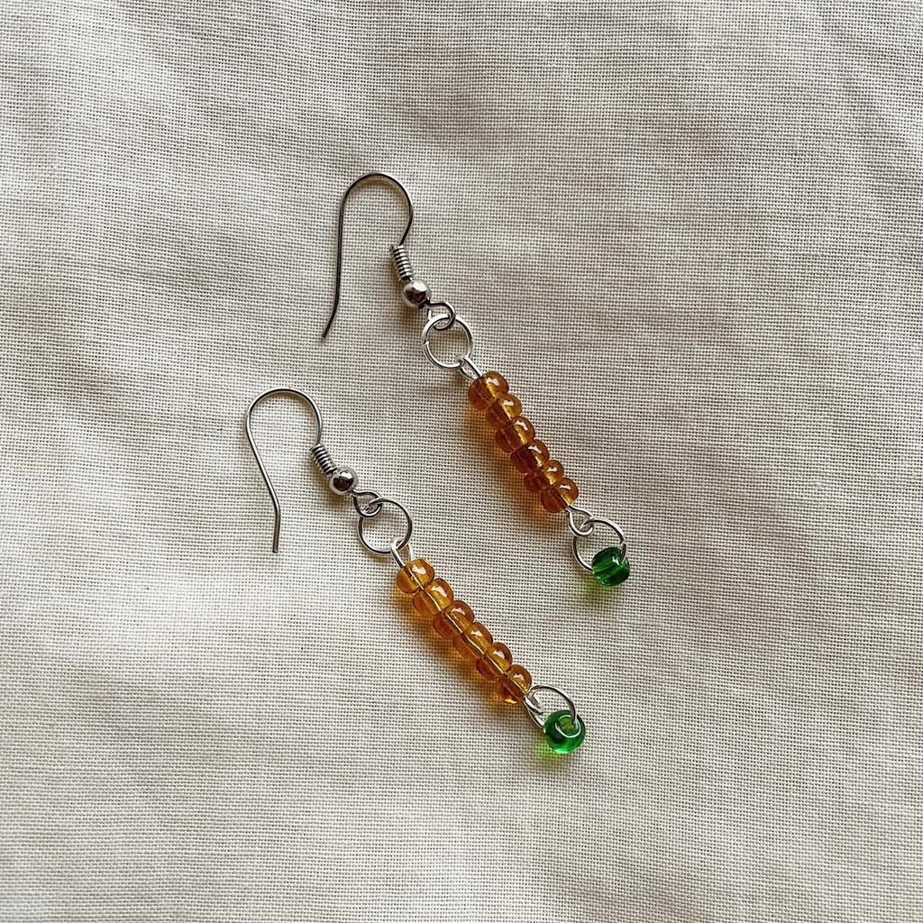 Light brown with a hint of green earrings ✨