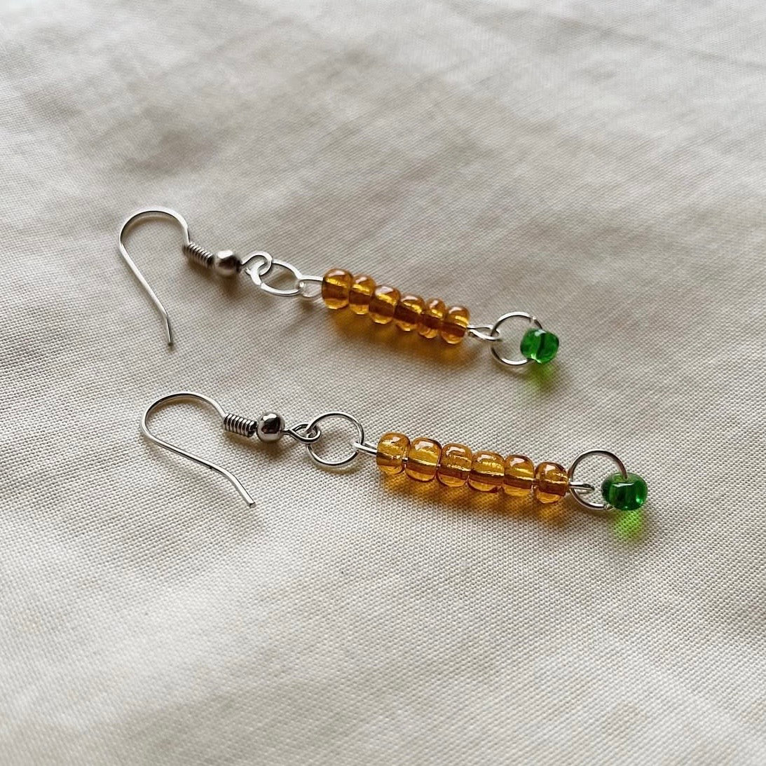 Light brown with a hint of green earrings ✨