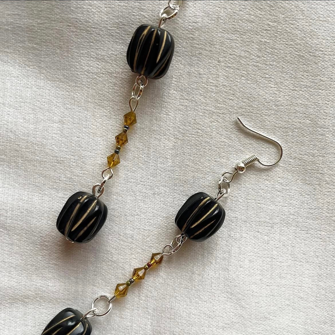 Black and gold beaded earrings ✨